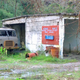 Illustration for article titled This Abandoned Soviet Sub Base Is Hiding Amazing Army Truck Barn Finds